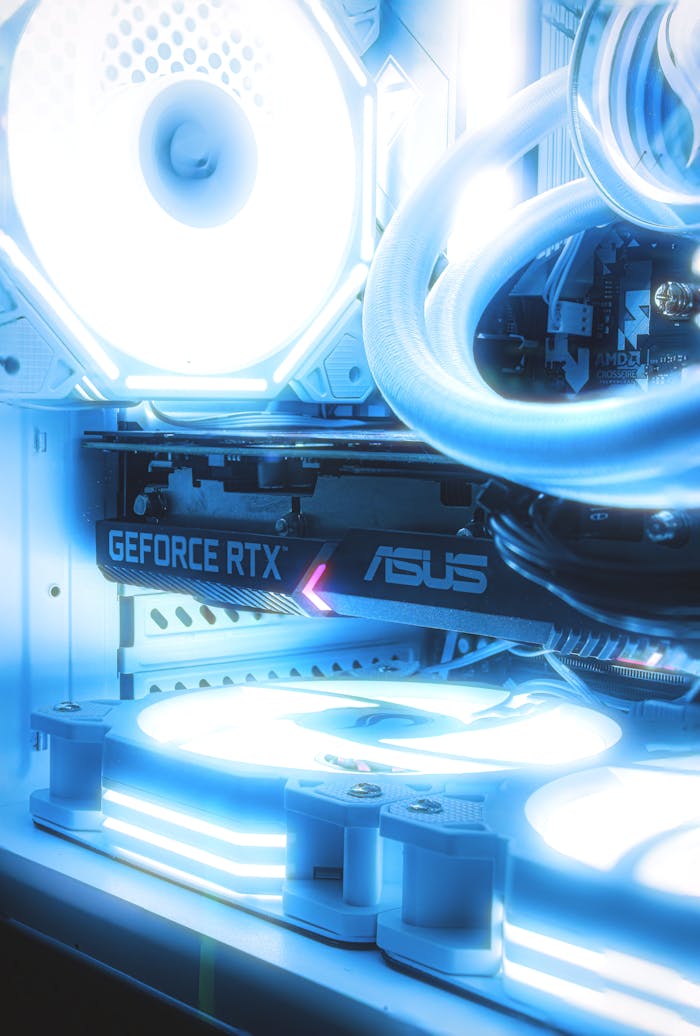 Close-up of a gaming PC interior with RGB lighting and GeForce RTX graphics card